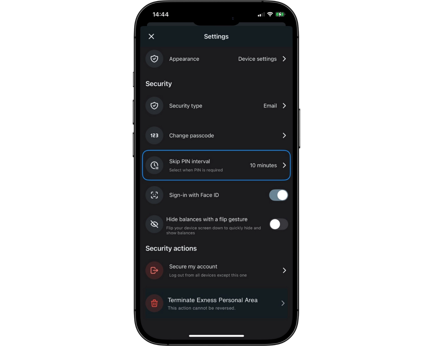 Exness review image showing the Exness Trade App login page where clients enter their login number, server, and password.