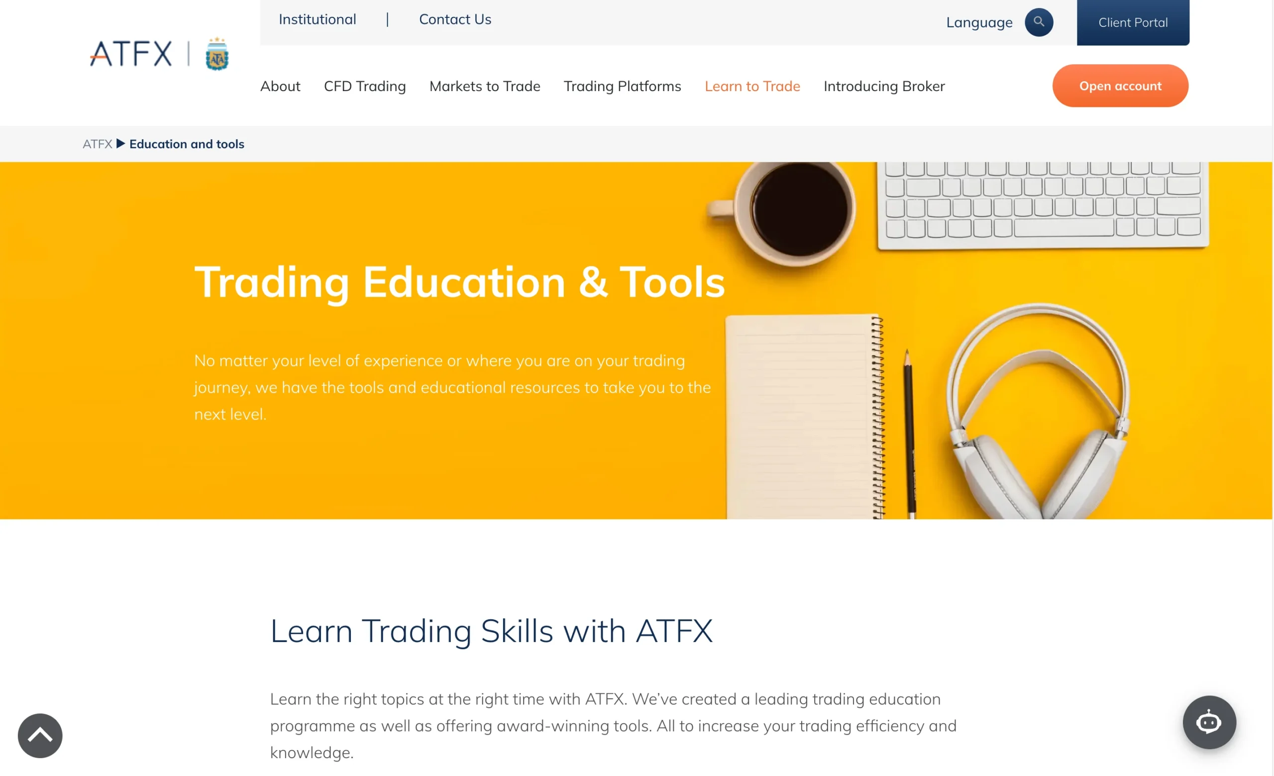 ATFX review image showing the education page with trading guides and educational material for clients.